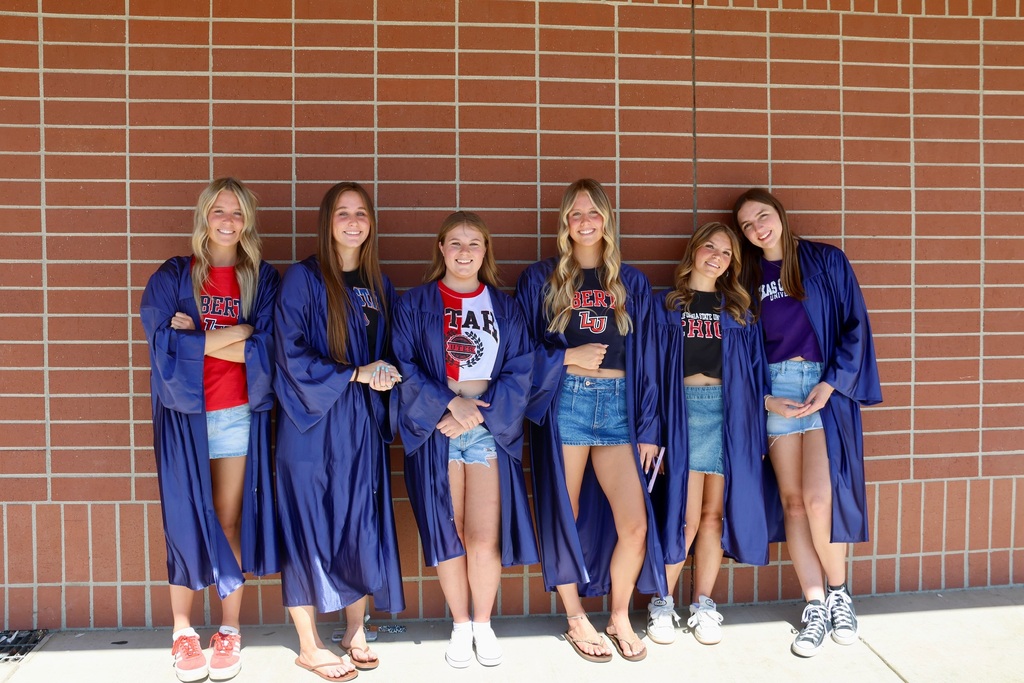 students in graduation gowns