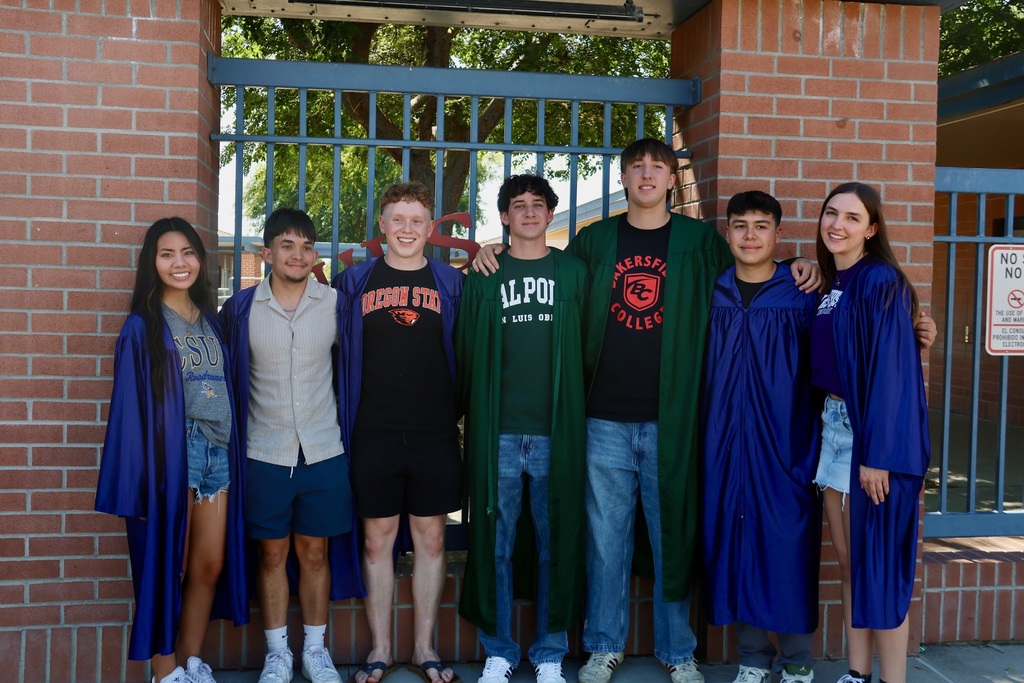 students in graduation gowns