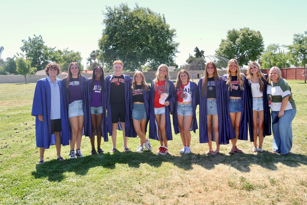 students in graduation gowns