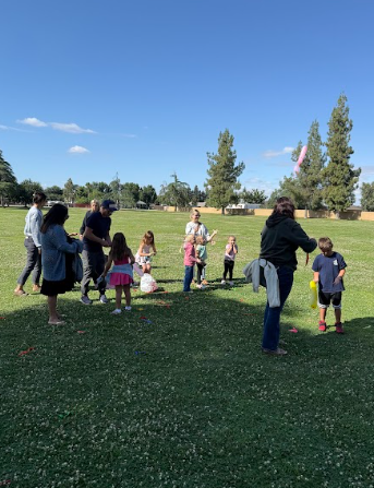 students and parents on a field