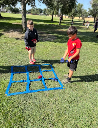 students playing tic tac toe
