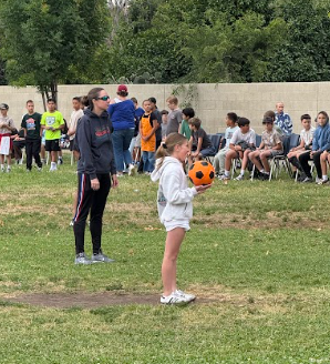 student holding a ball