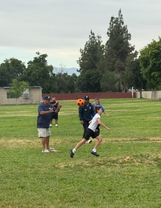 student dodging a ball