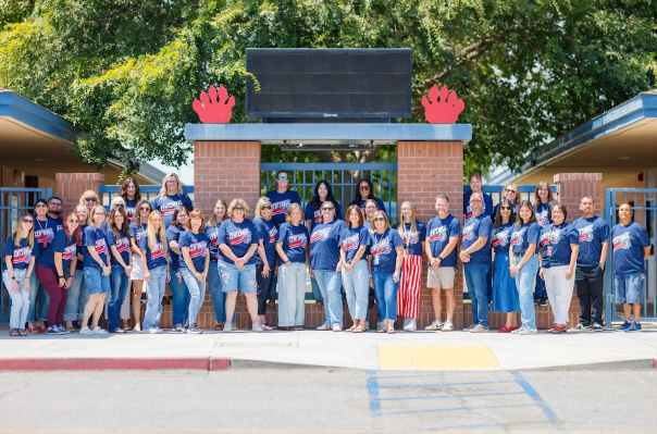 teachers In front of the school