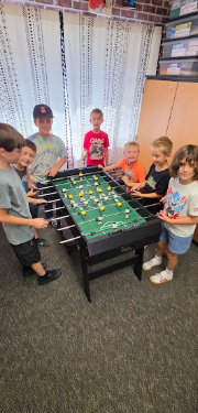 students playing foosball