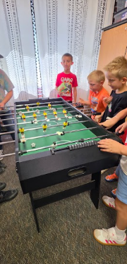 students playing foosball