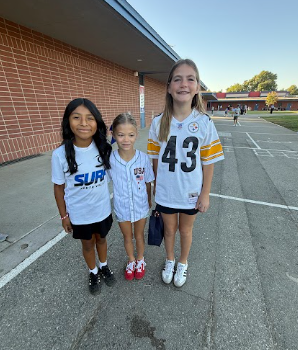students wearing sports jerseys
