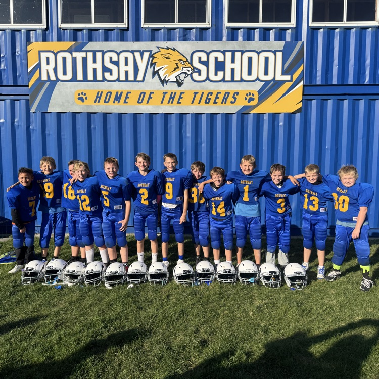 The third and fourth grade football players.