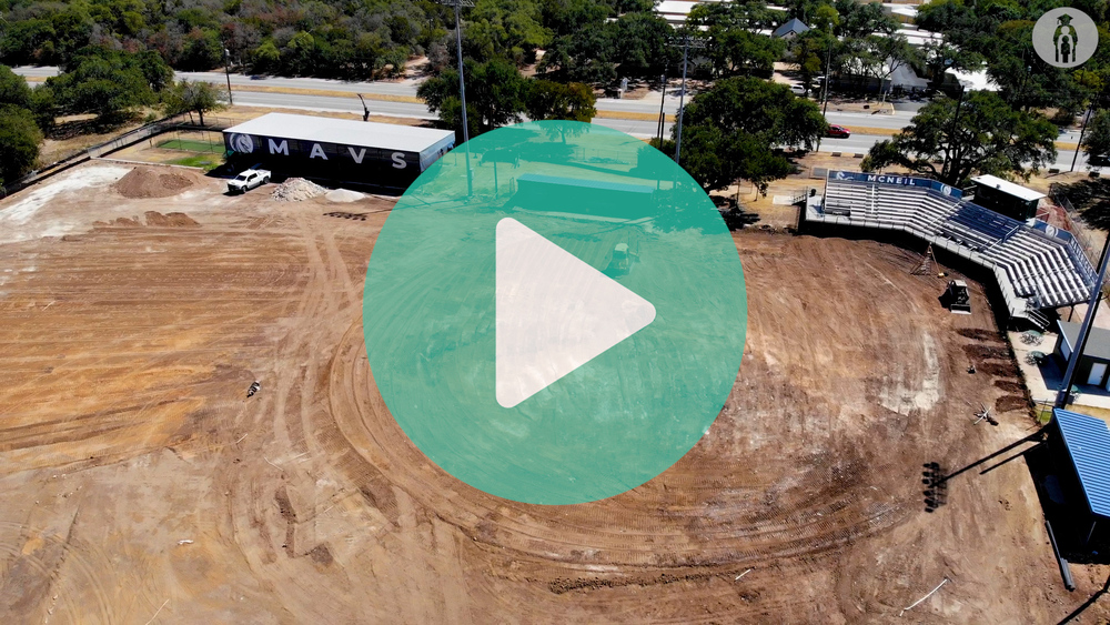 Image of McNeil High School Baseball stadium with just dirt covering entire ground.