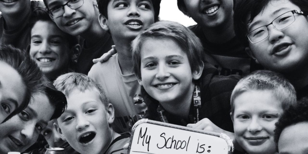 Group of students happy looking at the camera