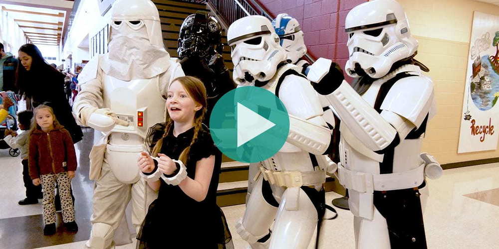 Student in photo with storm trooper for Comic Con