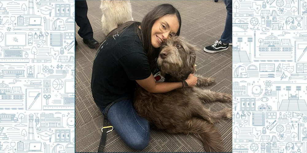 Girl hugging a dog