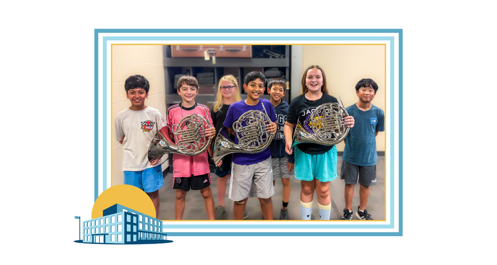 Students holding instruments purchased with bond funds