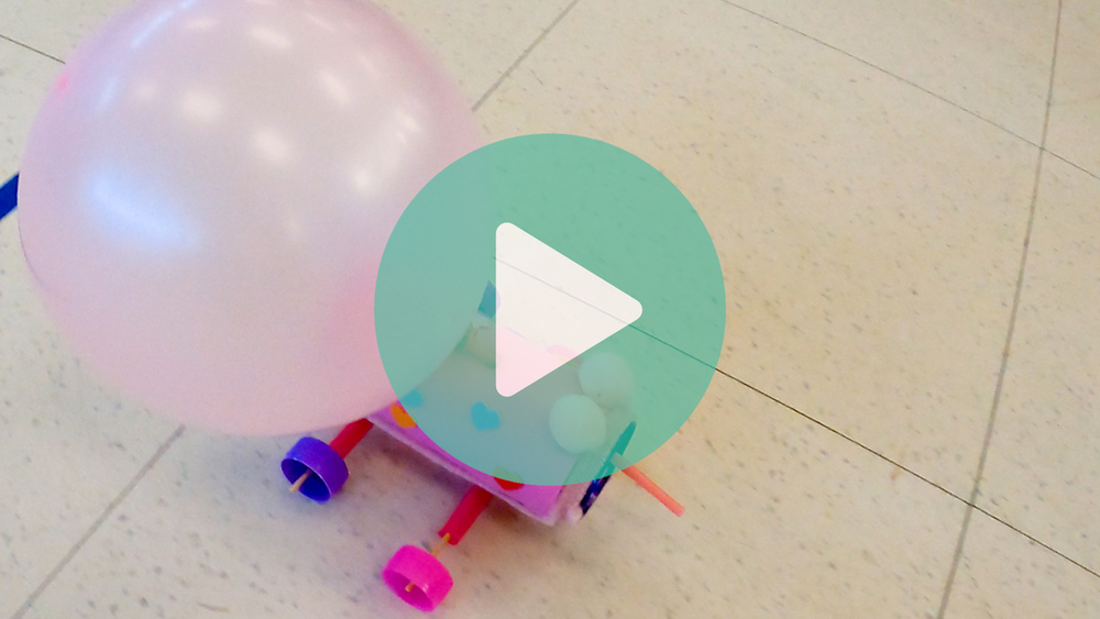 Picture of a balloon car going across the floor at Chisholm Trail Middle School