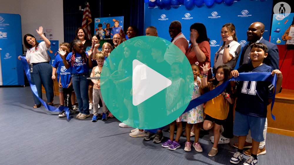 Cutting ribbon for Boys and Girls Clubs partenrship