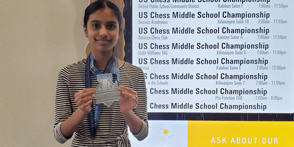 Sanmita Hosur taking the silver medal in her category at the 2023 National Middle School (K-8) Chess Championship tournament.