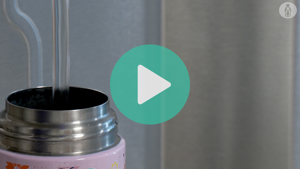 Picture of water bottle being filled with water.