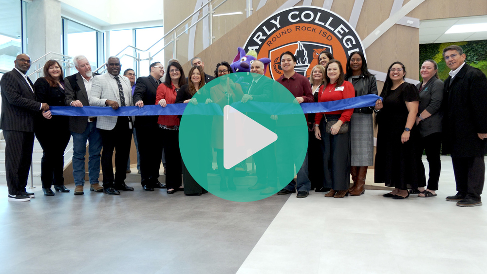 Picture of Round Rock ISD leaders cutting the ribbon at ECHS