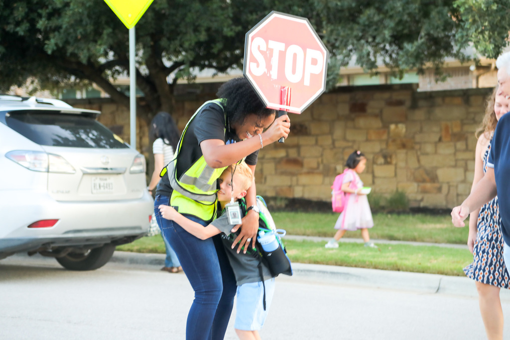 Round Rock ISD 2025 First Day of School. Image with students, staff, and families on the first day.