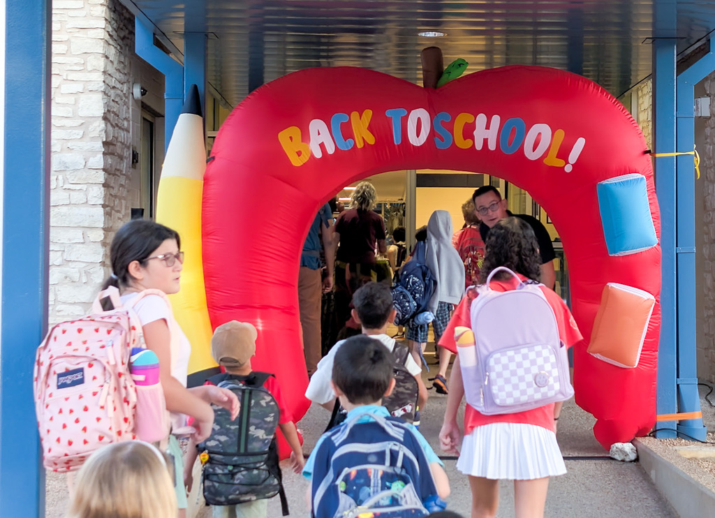 Round Rock ISD 2025 First Day of School. Image with students, staff, and families on the first day.