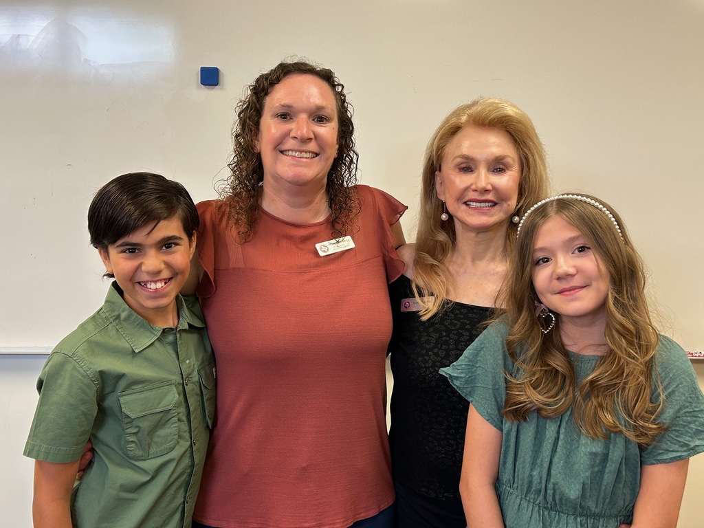 Photo of Two Chandler Oaks Students and Directors of Texas IB Schools