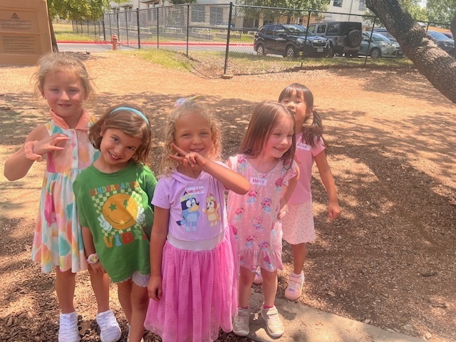 Group of 5 kinder students outside at recess