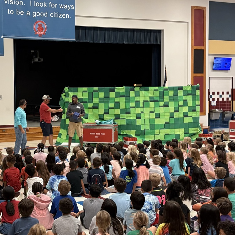students watching an assembly