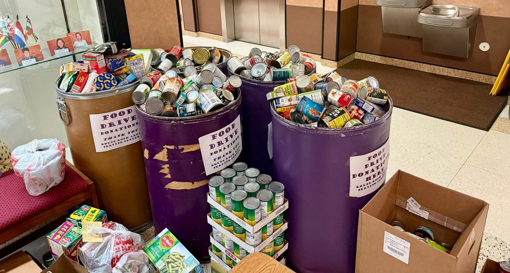 Photo of barrels of canned goods