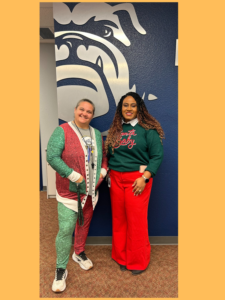 2 people dressed up in red and green.