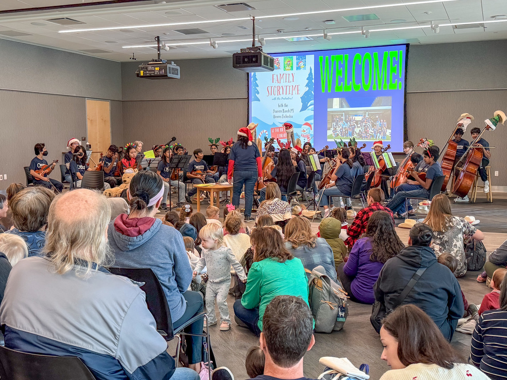 Pearson Ranch Middle School Orchestra performing at the public library