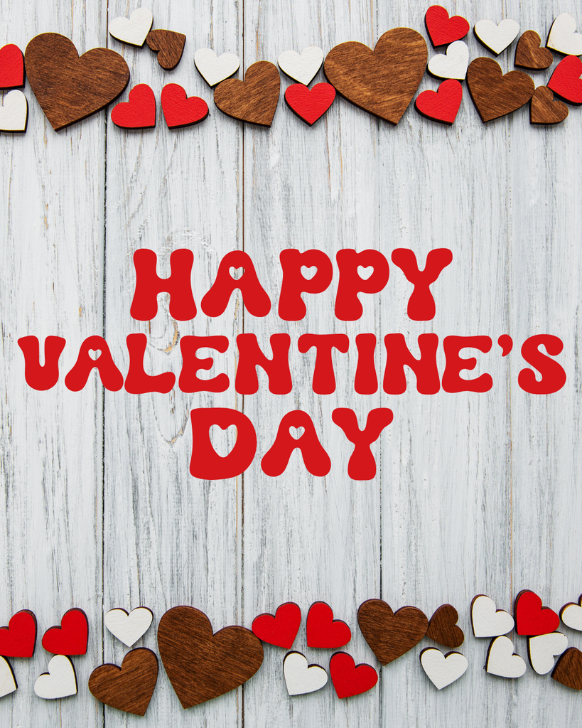 Here is the alt text for your Valentine's Day image:  The image features the words "HAPPY VALENTINE'S DAY" centered in a playful, bold red font on a light-colored, vertical wooden plank background. Small heart shapes are cut out of the letters "A" and "P." The top and bottom borders of the image are decorated with a variety of small wooden and red-painted hearts scattered across the planks.