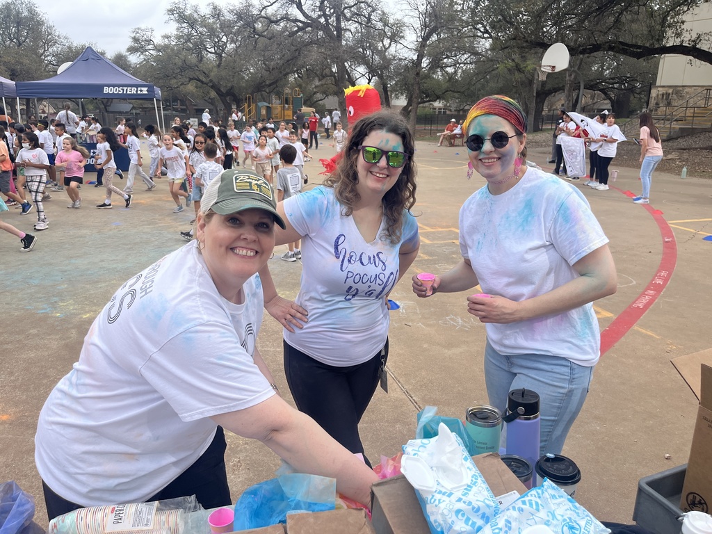 3 specials teachers smiling getting ready for the color run