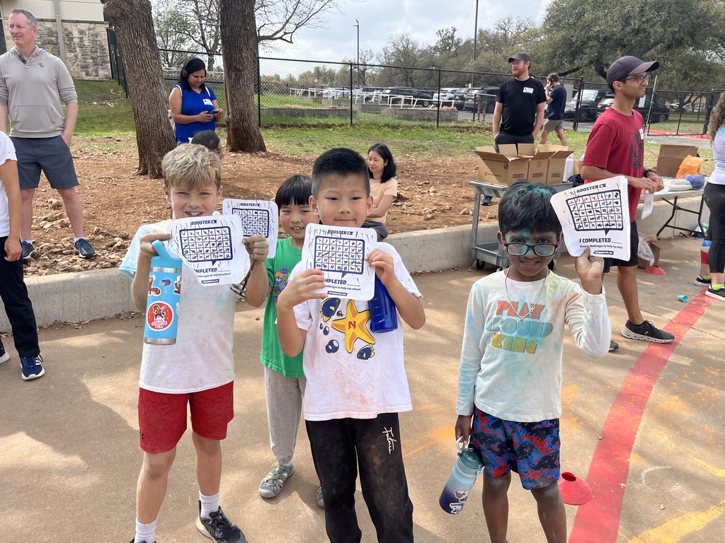 2nd grade boys showing off their laps ran.