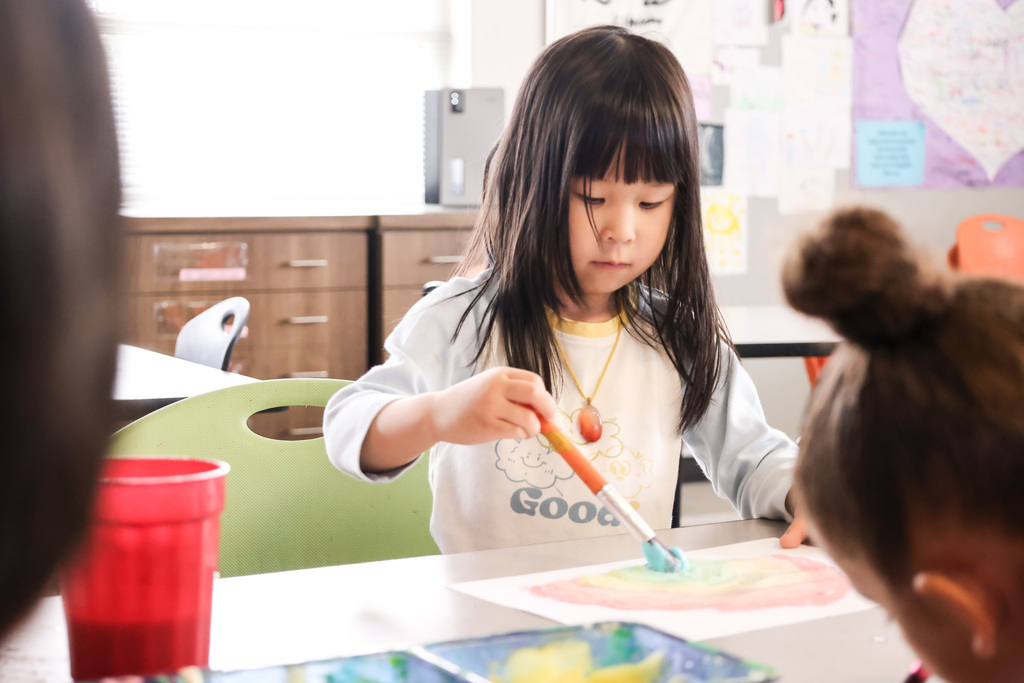 Pre K Student making artwork