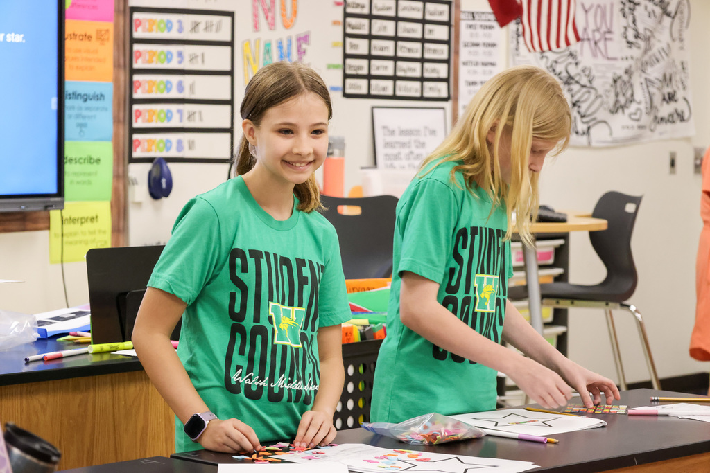 Middle school students at Visionary Voices Enrichment Event working on leadership projects and activities.