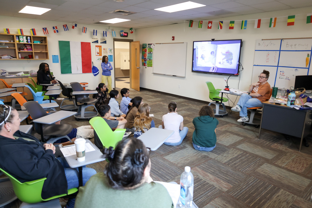 Middle school students at Visionary Voices Enrichment Event working on leadership projects and activities.
