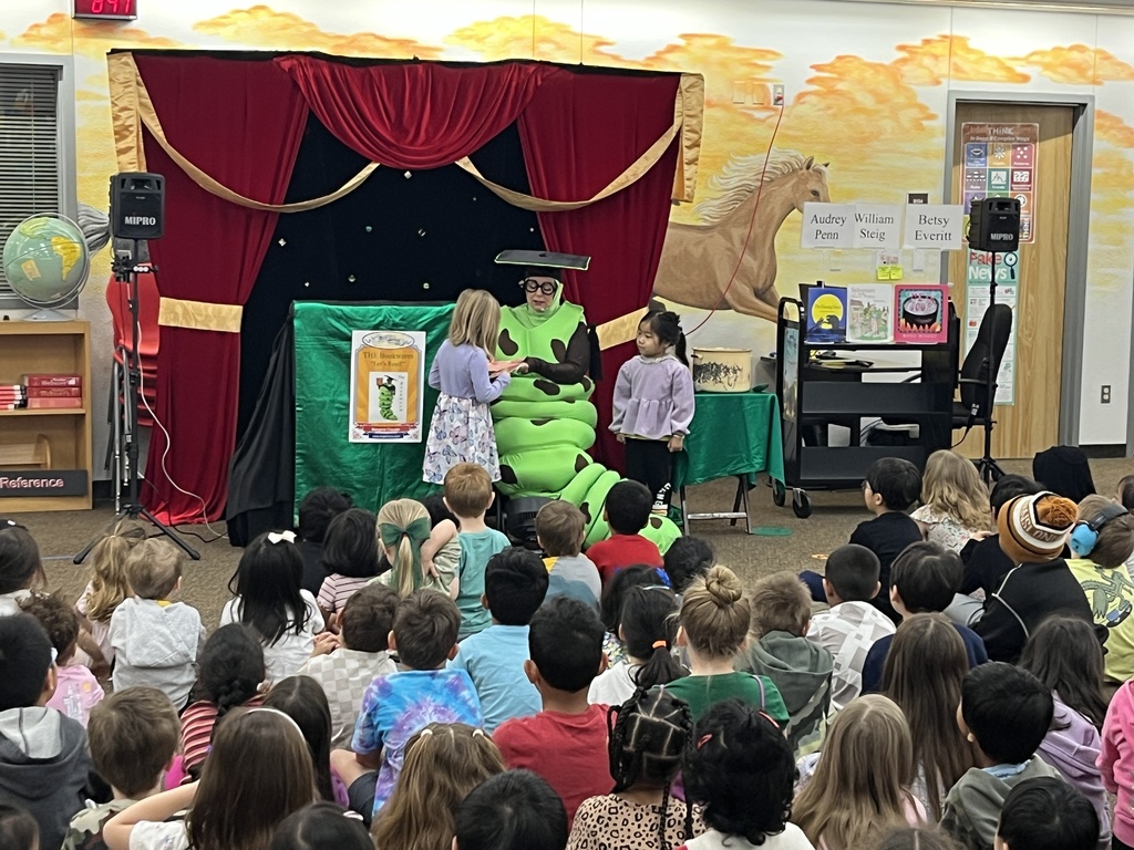 Bookworm visitor with students in Kinder, 1st and 2nd. 