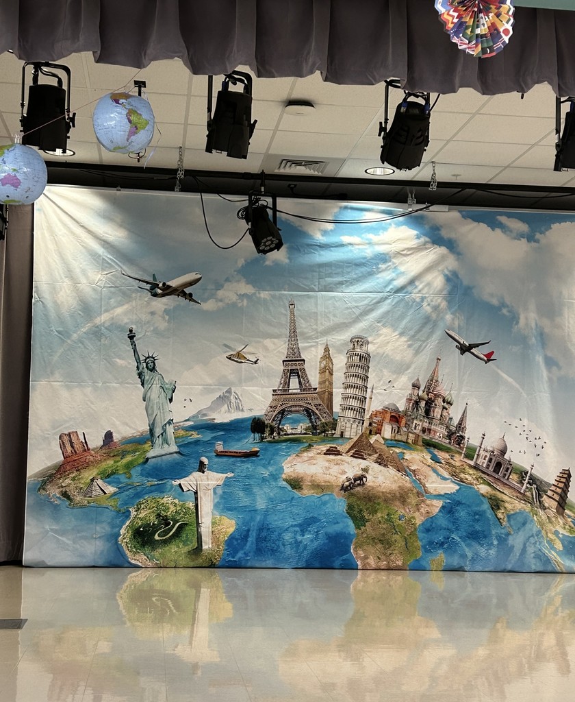 The image is a picture of the backdrop for JLJ's Celebrations Around the World
