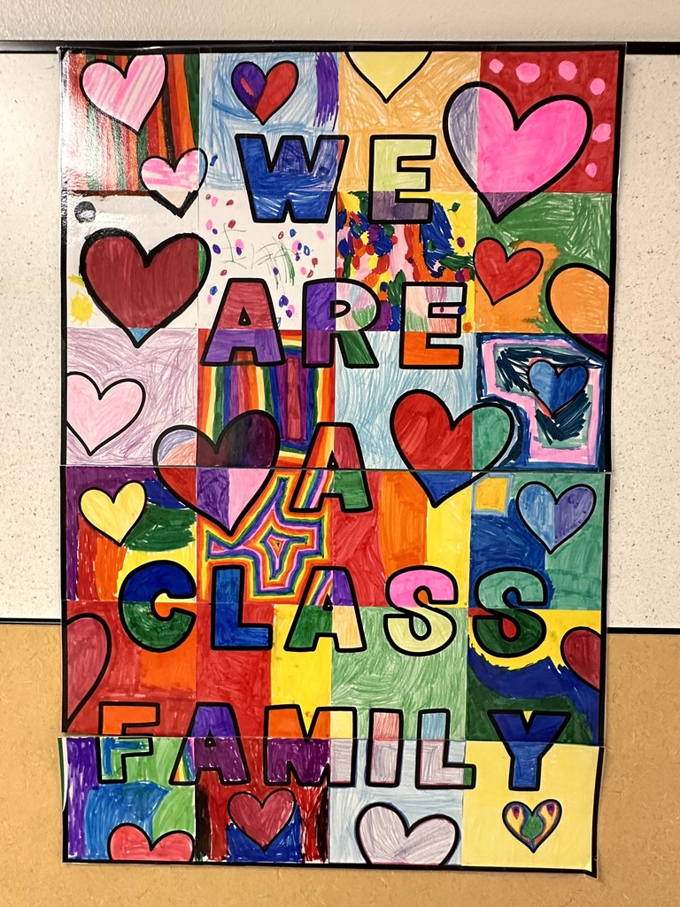 A colorful student made poster with hearts that reads We Are A Class Family.