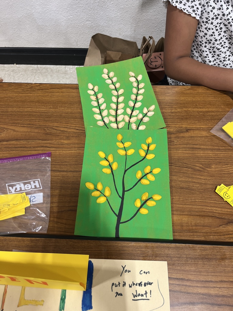 A piece of art created by a 3rd grader using pistachio shells.