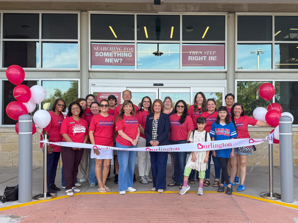 Burlington Donation with Round Rock ISD staff and kids