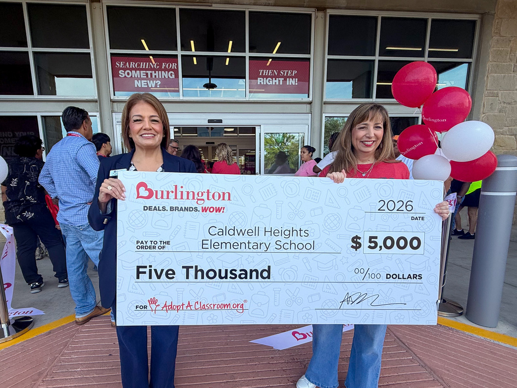 Burlington Donation with Round Rock ISD staff and kids