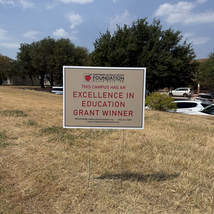 Grant winner sign outside of the school