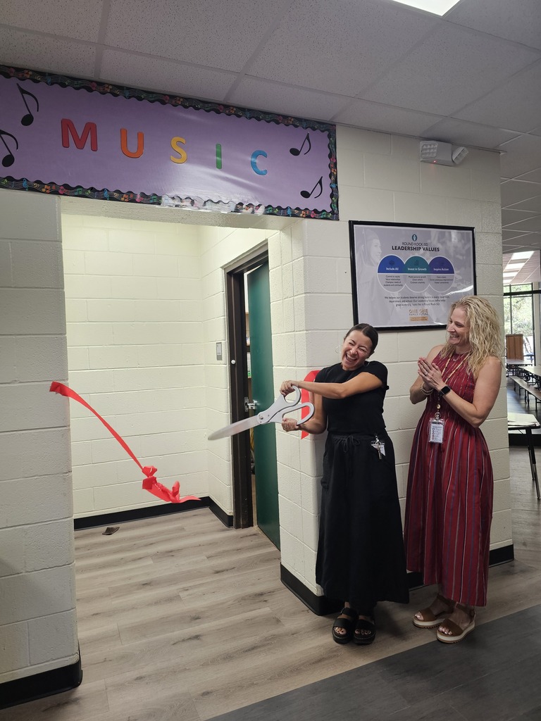 Teacher ribbon cutting for new classroom at LME