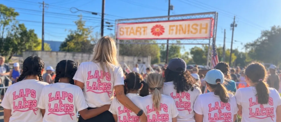 Decorative image of Students about to Run Laps for Laces