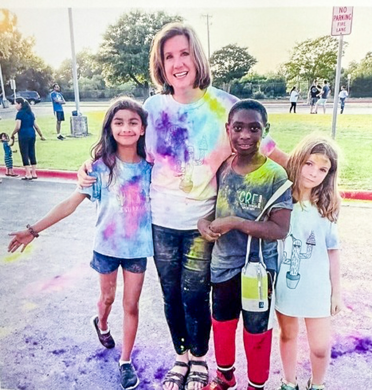 Vicki Crain with students during Diwali