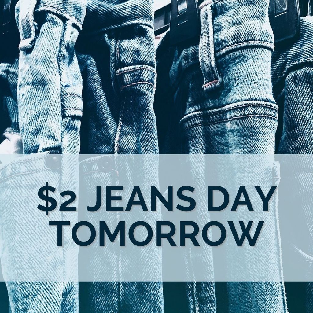 $2 Jeans Day Tomorrow with Jeans in the background.