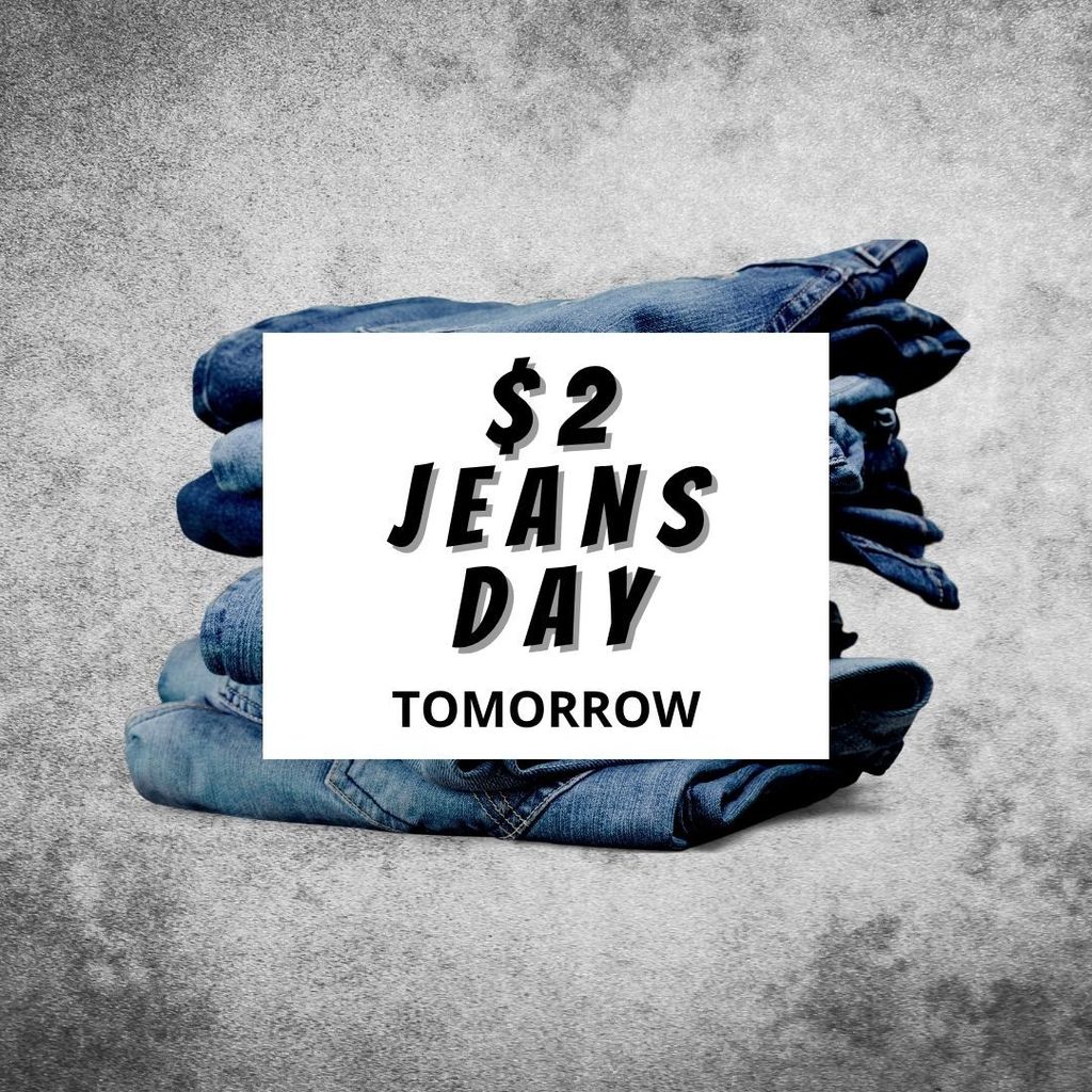 $2 Jeans Day Tomorrow with a stack of jeans
