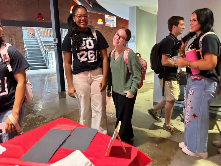 two female student smiling for a photo