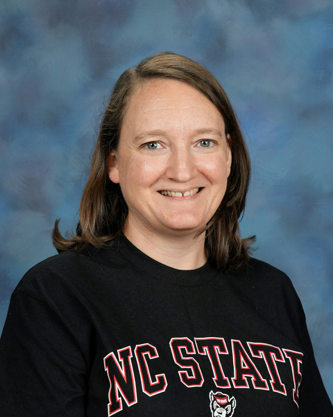 Yearbook portrait of Melanie Winstead wearing a NCS State tshirt. 